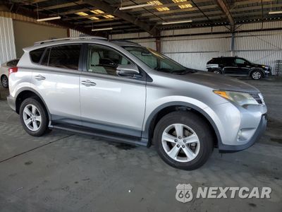 Czwarte zdjęcie samochodu z boku: 2014 TOYOTA RAV4 XLE VIN:JTMWFREV8EJ000542 - miniatura