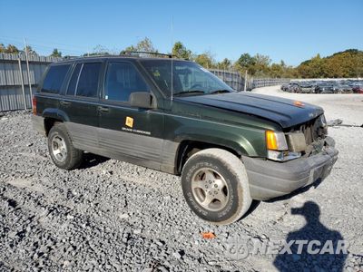 Czwarte zdjęcie samochodu z boku: 1997 JEEP CHEROKEE VIN:1J4FX58S1VC711151 - miniatura