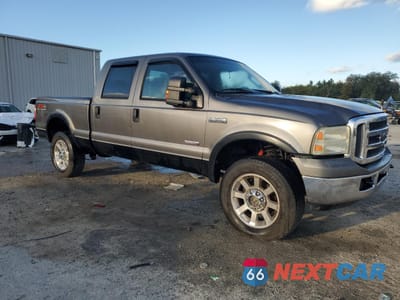 Czwarte zdjęcie samochodu z boku: 2006 FORD F350 SRW SUPER DUTY VIN:1FTWW31P96ED79677 - miniatura