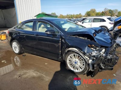 Czwarte zdjęcie samochodu z boku: 2016 FORD FUSION SE VIN:3FA6P0T93GR310059 - miniatura