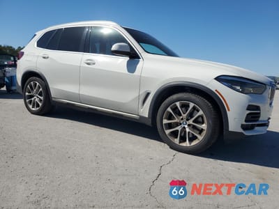 Czwarte zdjęcie samochodu z boku: 2022 BMW X5 XDRIVE45E VIN:5UXTA6C02N9M26931 - miniatura