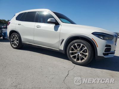 Czwarte zdjęcie samochodu z boku: 2022 BMW X5 XDRIVE45E VIN:5UXTA6C02N9M26931 - miniatura