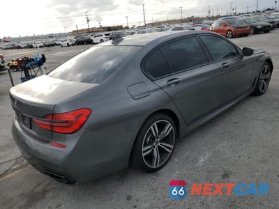 Trzecie zdjęcie samochodu z tyłu: 2017 BMW 740 I VIN:WBA7E2C59HG740424 - miniatura