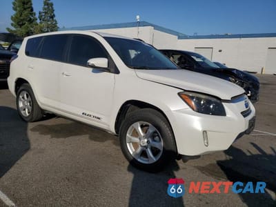 Czwarte zdjęcie samochodu z boku: 2014 TOYOTA RAV4 EV VIN:2T3YL4DV6EW003480 - miniatura