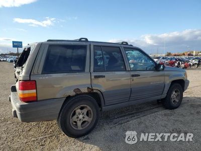 Trzecie zdjęcie samochodu z tyłu: 1997 JEEP GRAND CHEROKEE LAREDO VIN:1J4GZ58S9VC673117 - miniatura