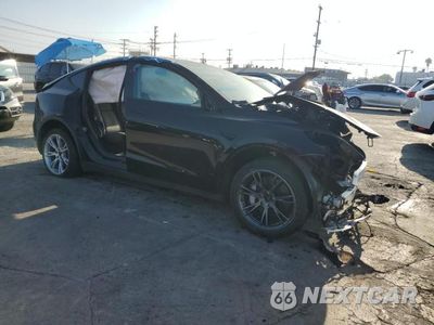 Czwarte zdjęcie samochodu z boku: 2024 TESLA Y VIN:7SAYGDEE6RF025545 - miniatura