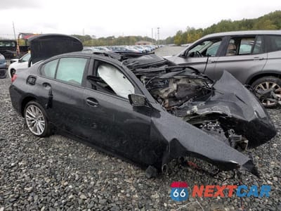 Czwarte zdjęcie samochodu z boku: 2023 BMW 330XI VIN:3MW89FF00P8D70011 - miniatura