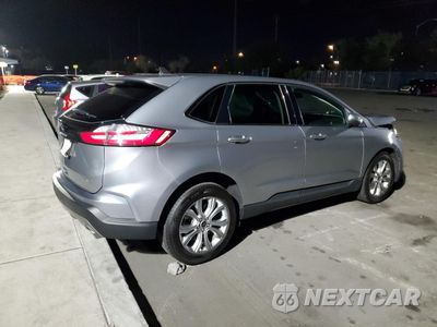 Trzecie zdjęcie samochodu z tyłu: 2023 FORD EDGE TITANIUM VIN:2FMPK4K92PBA39009 - miniatura