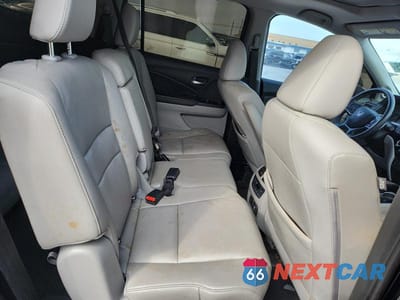 Zdjęcie 11 z 14 samochodu: 2019 HONDA PILOT TOURING AWD 8-PASS VIN:5FNYF6H96KB019549 - miniatura