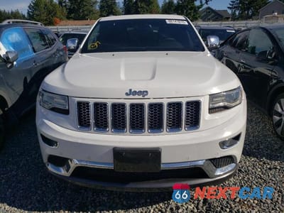 Piąte zdjęcie samochodu w środku: 2014 JEEP GRAND CHEROKEE SUMMIT VIN:1C4RJFJT4EC178080 - miniatura