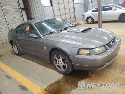 Czwarte zdjęcie samochodu z boku: 2004 FORD MUSTANG VIN:1FAFP40604F189503 - miniatura