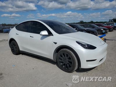 Czwarte zdjęcie samochodu z boku: 2023 TESLA MODEL Y VIN:7SAYGDEE2PF752596 - miniatura