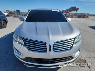 Piąte zdjęcie samochodu w środku: 2016 LINCOLN MKC PREMIERE VIN:5LMCJ1C96GUJ04997 - miniatura