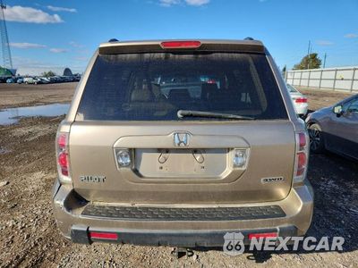 Zdjęcie 11 z 26 samochodu: 2006 HONDA PILOT EX VIN:5FNYF18566B008122 - miniatura
