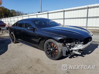 Czwarte zdjęcie samochodu z boku: 2022 BMW M850XI VIN:WBAGV8C09NCH96974 - miniatura