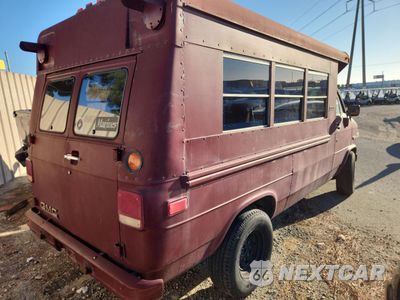 Trzecie zdjęcie samochodu z tyłu: 1988 GMC RALLY WAGON / VAN G3500 VIN:2GDGG35J7J4518653 - miniatura