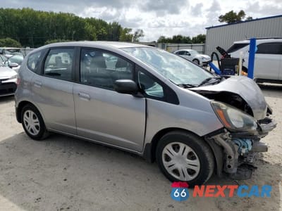 Czwarte zdjęcie samochodu z boku: 2010 HONDA FIT VIN:JHMGE8H28AS000725 - miniatura