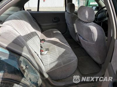 Zdjęcie 10 z 12 samochodu: 2001 CHEVROLET LUMINA VIN:2G1WL52J411298104 - miniatura