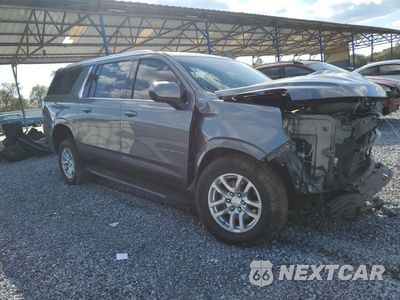 Czwarte zdjęcie samochodu z boku: 2021 CHEVROLET SUBURBAN C1500 LT VIN:1GNSCCKD6MR274216 - miniatura