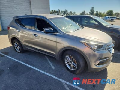Czwarte zdjęcie samochodu z boku: 2017 HYUNDAI SANTA FE SPORT 2.4L VIN:5XYZTDLB5HG418482 - miniatura