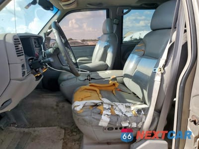 Zdjęcie 7 z 14 samochodu: 1999 CHEVROLET TAHOE VIN:1GNEK13R5XR149467 - miniatura