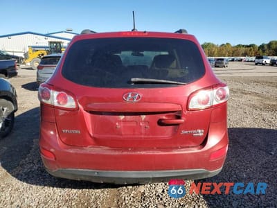 Zdjęcie 6 z 12 samochodu: 2011 HYUNDAI SANTA FE GLS VIN:5XYZGDAB5BG069290 - miniatura