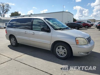 Czwarte zdjęcie samochodu z boku: 2005 FORD FREESTAR SEL VIN:2FMZA52265BA92359 - miniatura