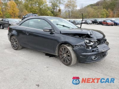 Czwarte zdjęcie samochodu z boku: 2014 VOLKSWAGEN EOS KOMFORT VIN:WVWBW8AH4EV005691 - miniatura