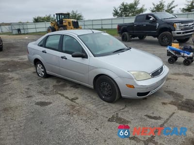 Czwarte zdjęcie samochodu z boku: 2005 FORD FOCUS ZX4 VIN:1FAFP34N25W202670 - miniatura