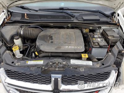 Zdjęcie 12 z 13 samochodu: 2012 DODGE GRAND CARAVAN SE VIN:2C4RDGBG0CR351712 - miniatura
