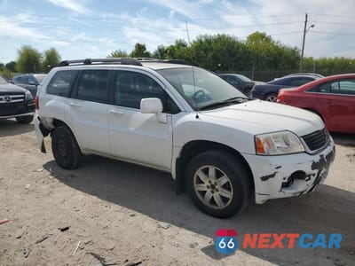 Czwarte zdjęcie samochodu z boku: 2011 MITSUBISHI ENDEAVOR LS VIN:4A4JN2AS7BE036025 - miniatura