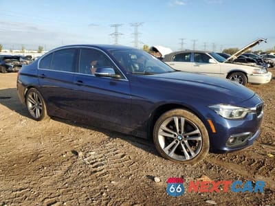 Czwarte zdjęcie samochodu z boku: 2017 BMW 330 XI VIN:WBA8D9G36HNU62702 - miniatura