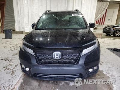 Piąte zdjęcie samochodu w środku: 2019 HONDA PASSPORT TOURING VIN:5FNYF8H9XKB010610 - miniatura