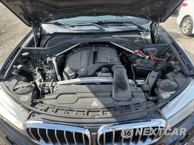 Zdjęcie 12 z 13 samochodu: 2014 BMW X5 XDRIVE35I VIN:5UXKR0C53E0H16888 - miniatura