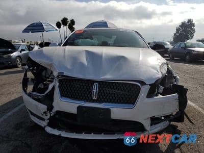 Piąte zdjęcie samochodu w środku: 2018 LINCOLN MKZ RESERVE VIN:3LN6L5FC2JR605487 - miniatura