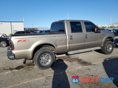 Trzecie zdjęcie samochodu z tyłu: 2004 FORD F250 SUPER DUTY VIN:1FTNW21P64ED72804 - miniatura