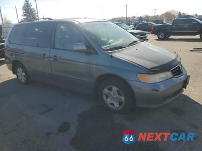 Czwarte zdjęcie samochodu z boku: 2002 HONDA ODYSSEY EXL VIN:5FNRL18962B041065 - miniatura