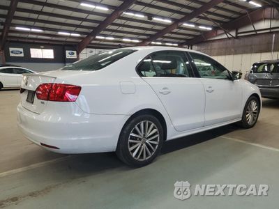 Trzecie zdjęcie samochodu z tyłu: 2014 VOLKSWAGEN JETTA SEL VIN:3VWL17AJ3EM350394 - miniatura