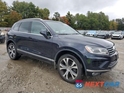 Czwarte zdjęcie samochodu z boku: 2017 VOLKSWAGEN TOUAREG WOLFSBURG VIN:WVGRF7BP9HD005058 - miniatura