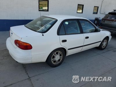 Trzecie zdjęcie samochodu z tyłu: 1999 CHEVROLET GEO PRIZM BASE VIN:1Y1SK5480XZ413327 - miniatura