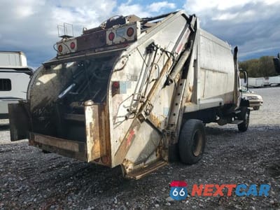 Trzecie zdjęcie samochodu z tyłu: 2004 FREIGHTLINER M2 106 MED - Refuse Truck VIN:1FVACYDC04DN24850 - miniatura