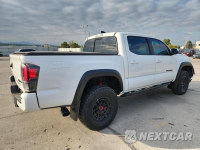 Trzecie zdjęcie samochodu z tyłu: 2023 TOYOTA TACOMA DOUBLE CAB VIN:3TYCZ5AN4PT118915 - miniatura