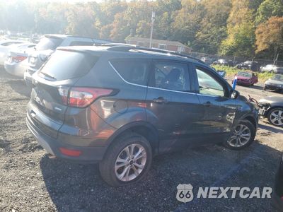 Trzecie zdjęcie samochodu z tyłu: 2018 FORD ESCAPE SE VIN:1FMCU0GD0JUA18806 - miniatura