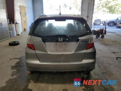 Zdjęcie 6 z 13 samochodu: 2010 HONDA FIT SPORT VIN:JHMGE8H49AC001975 - miniatura