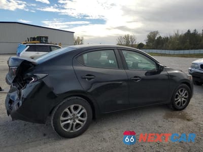 Trzecie zdjęcie samochodu z tyłu: 2017 TOYOTA YARIS IA BASE VIN:3MYDLBYV9HY196155 - miniatura