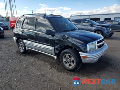 Czwarte zdjęcie samochodu z boku: 2002 CHEVROLET TRACKER LT VIN:2CNBJ634426921876 - miniatura