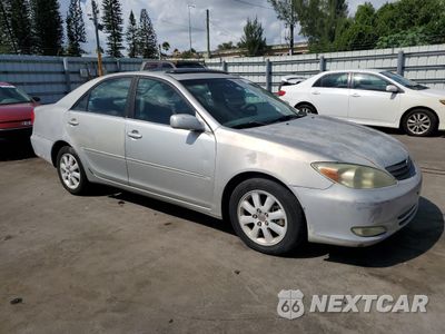 Czwarte zdjęcie samochodu z boku: 2004 TOYOTA CAMRY LE VIN:4T1BF30K94U066986 - miniatura