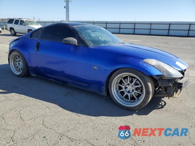 Czwarte zdjęcie samochodu z boku: 2005 NISSAN 350Z COUPE VIN:JN1AZ34D45M606638 - miniatura