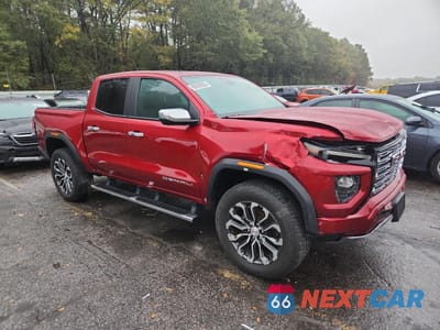 Czwarte zdjęcie samochodu z boku: 2023 GMC CANYON DENALI VIN:1GTP6FEK9P1125108 - miniatura