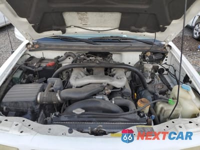 Zdjęcie 12 z 13 samochodu: 2003 CHEVROLET TRACKER LT VIN:2CNBJ634X36908812 - miniatura